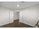 Bright hallway with tile flooring and two closed doors at 4840 Conough Ln, Las Vegas, NV 89149