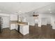 Modern white kitchen with granite countertops and mosaic backsplash at 4840 Conough Ln, Las Vegas, NV 89149