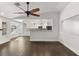 Open living room featuring a kitchen island and ceiling fan at 4840 Conough Ln, Las Vegas, NV 89149