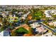 Aerial view of single-story home with tile roof and solar panels at 5305 Singing Hills Dr, Las Vegas, NV 89130