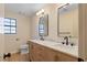 Stylish bathroom with double vanity, marble countertops, and updated fixtures at 5305 Singing Hills Dr, Las Vegas, NV 89130