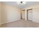 Bright bedroom with carpeted floors and built-in closet at 5305 Singing Hills Dr, Las Vegas, NV 89130