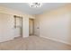 Cozy bedroom with carpeted floors and built-in closet at 5305 Singing Hills Dr, Las Vegas, NV 89130