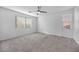 Spacious bedroom with neutral carpeting and large window at 5445 Tallulah Falls St, North Las Vegas, NV 89081