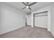 Spacious bedroom with ceiling fan and ample closet space at 5445 Tallulah Falls St, North Las Vegas, NV 89081