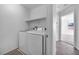 Bright laundry room with washer and dryer included at 5445 Tallulah Falls St, North Las Vegas, NV 89081