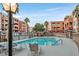 Inviting community pool with lounge chairs and a relaxing atmosphere at 59 E Agate Ave # 406, Las Vegas, NV 89123