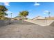 Large backyard with a block wall, ready for landscaping at 610 Roberta Alecia Ave, North Las Vegas, NV 89031