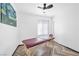 Bedroom featuring herringbone floors, a ceiling fan, and a window at 610 Roberta Alecia Ave, North Las Vegas, NV 89031