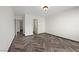 Bright room featuring herringbone floors and entryways at 610 Roberta Alecia Ave, North Las Vegas, NV 89031