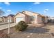 Charming single-story home with a two-car garage and low maintenance desert landscaping at 610 Roberta Alecia Ave, North Las Vegas, NV 89031