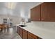 Eat-in kitchen featuring ample counter space, stylish herringbone floors, and modern appliances at 610 Roberta Alecia Ave, North Las Vegas, NV 89031