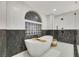 Elegant bathroom featuring a free-standing tub and shower at 62 Incline Village Ct, Henderson, NV 89074