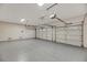 Three-car garage with epoxy flooring and ample storage space at 62 Incline Village Ct, Henderson, NV 89074