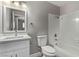 Clean bathroom with white vanity, tub, and shower at 6412 Miragrande Dr, Las Vegas, NV 89108