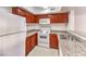 Kitchen with granite countertops and dark wood cabinets at 6800 E Lake Mead Blvd # 1047, Las Vegas, NV 89156