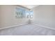 Bright bedroom with large windows and neutral carpet at 6828 Pacific Robin St, North Las Vegas, NV 89084