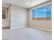 Bright dining area with large window and tile floors at 6828 Pacific Robin St, North Las Vegas, NV 89084