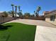 Backyard with artificial turf and gravel areas at 707 Arrowhead Trl, Henderson, NV 89002