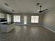 Kitchen with island, stainless steel appliances, and tile floors at 707 Arrowhead Trl, Henderson, NV 89002