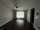 Living room with hardwood floors and ceiling fan at 707 Arrowhead Trl, Henderson, NV 89002