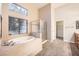 Bathroom featuring a large soaking tub and shower at 7131 Celadine St, Las Vegas, NV 89131