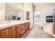 Double vanity bathroom with soaking tub and shower at 7131 Celadine St, Las Vegas, NV 89131