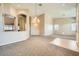 Open dining area with high ceilings and neutral walls at 7131 Celadine St, Las Vegas, NV 89131