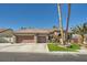 House exterior showcasing a two-car garage and neatly landscaped front yard at 7131 Celadine St, Las Vegas, NV 89131