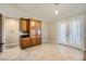 Spacious kitchen with wood cabinets, granite countertops, and stainless steel appliances at 7131 Celadine St, Las Vegas, NV 89131