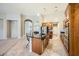 Updated kitchen with wood cabinetry and granite counters at 7131 Celadine St, Las Vegas, NV 89131