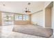 Living room with patio access and pool view at 7131 Celadine St, Las Vegas, NV 89131