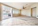 Living room with patio access and pool view at 7131 Celadine St, Las Vegas, NV 89131