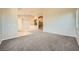 Spacious living room with high ceilings and carpeted floors at 7131 Celadine St, Las Vegas, NV 89131