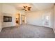 Main bedroom featuring fireplace and access to patio at 7131 Celadine St, Las Vegas, NV 89131