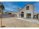 Home's backyard features a large patio, gravel, and block wall at 7214 Paradise Bay Dr, Las Vegas, NV 89119