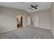 Primary bedroom with ceiling fan and en suite bath at 7214 Paradise Bay Dr, Las Vegas, NV 89119