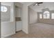 Upstairs bedroom with built-in shelving and access to bath at 7214 Paradise Bay Dr, Las Vegas, NV 89119