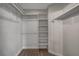 Walk-in closet with shelving and hanging rods for ample storage at 7214 Paradise Bay Dr, Las Vegas, NV 89119