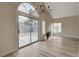 Bright dining room with patio access and chandelier at 7214 Paradise Bay Dr, Las Vegas, NV 89119