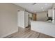 Modern kitchen with white cabinets and quartz counters at 7214 Paradise Bay Dr, Las Vegas, NV 89119