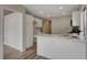 Modern kitchen with white cabinets and quartz counters at 7214 Paradise Bay Dr, Las Vegas, NV 89119