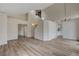 Open concept living room with high ceilings and staircase at 7214 Paradise Bay Dr, Las Vegas, NV 89119