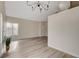 Bright living room with wood-look flooring and fireplace at 7214 Paradise Bay Dr, Las Vegas, NV 89119