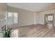 Spacious living room features wood-look flooring and natural lighting at 7214 Paradise Bay Dr, Las Vegas, NV 89119