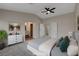 Spacious main bedroom features neutral paint colors, carpet, and an ensuite bathroom at 7214 Paradise Bay Dr, Las Vegas, NV 89119