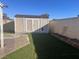 Backyard with storage shed and artificial turf at 7221 Tempest Pl, Las Vegas, NV 89145