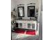 Double vanity bathroom with modern white cabinets and granite countertop at 7221 Tempest Pl, Las Vegas, NV 89145