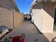 Side yard with concrete patio and block wall at 7221 Tempest Pl, Las Vegas, NV 89145