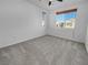 Spacious bedroom with carpet and large window at 7627 Alexander Hills St, Las Vegas, NV 89139